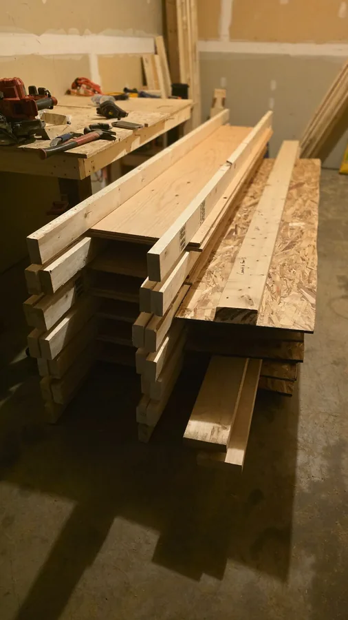 Lumber and carpentry tools prepared for an outdoor construction project in Saskatoon