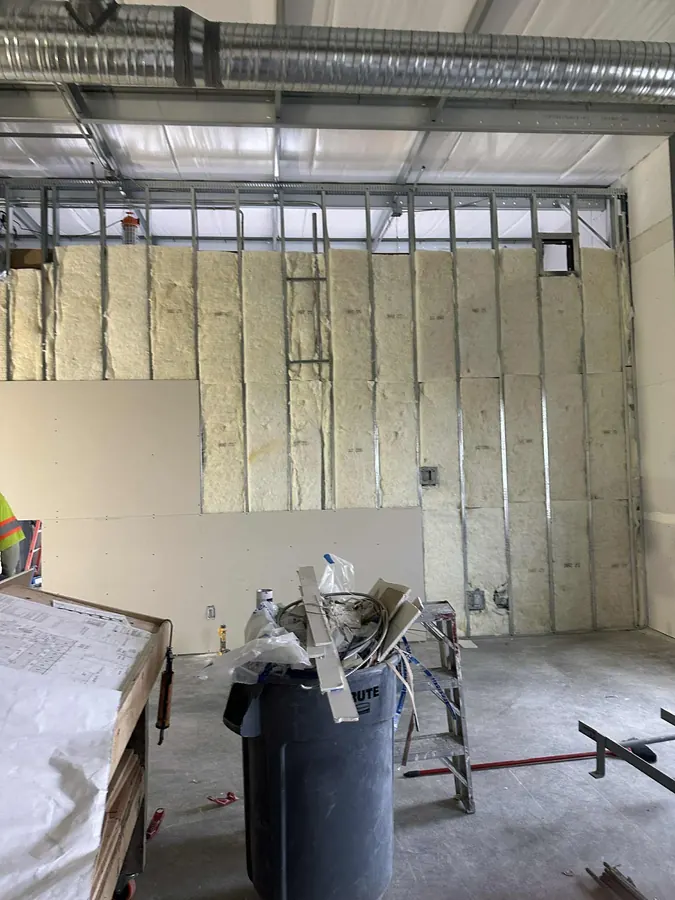 Commercial steel-stud wall framing and insulation in Saskatoon