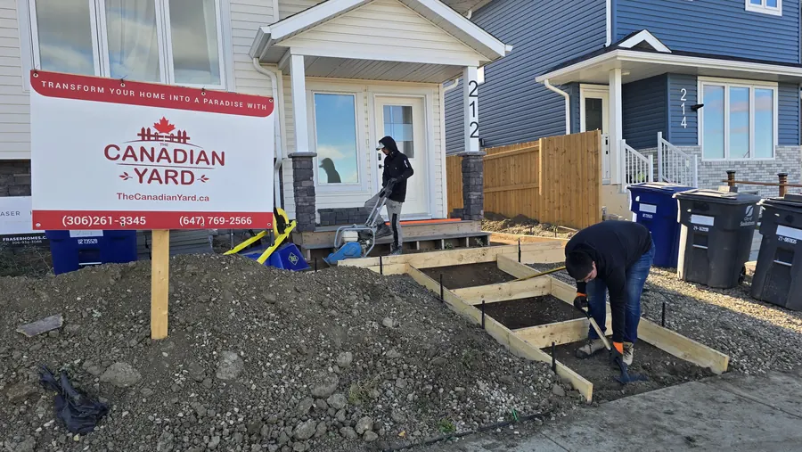 Concrete site preparation beside a Saskatoon home