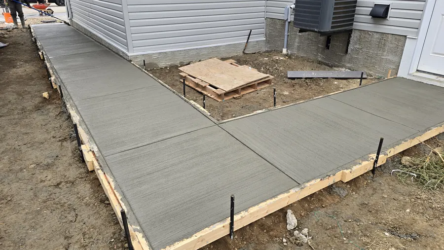 Completed concrete walkway and access path in Saskatoon