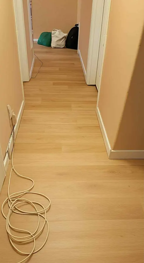 Completed residential hallway flooring in Saskatoon