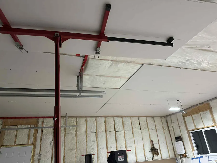 Garage ceiling drywall board installation in Saskatoon