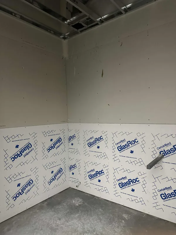Interior drywall installation before finishing and painting in Saskatoon